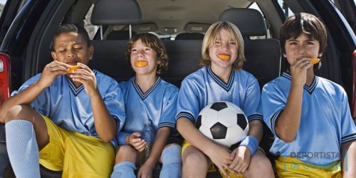 Boys' soccer team in car