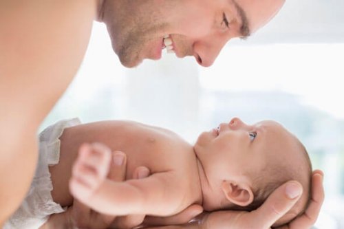 dad-baby-cuddle-alamy