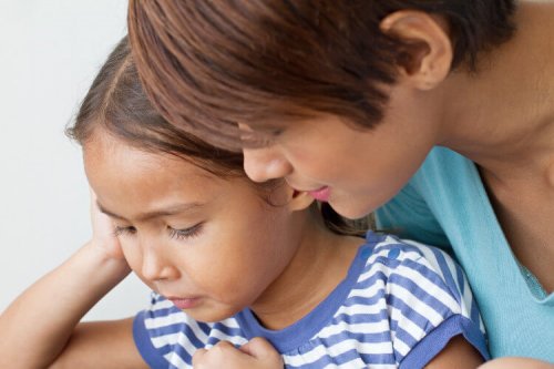 Mother talking to her daughter.