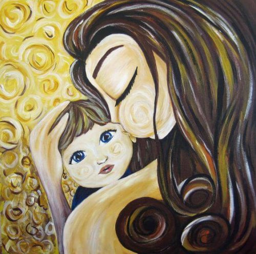 Une maman embrasse son enfant, une façon de montrer à votre enfant que vous l'aimez