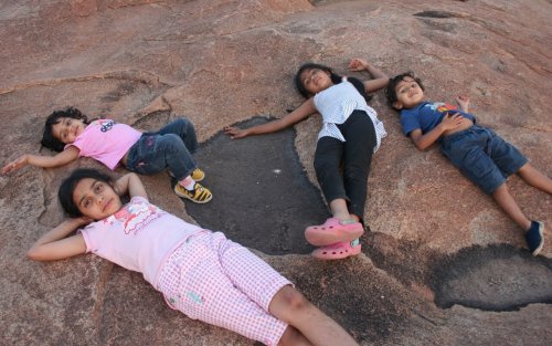 happy_children_at_sunset_point_hampi_india