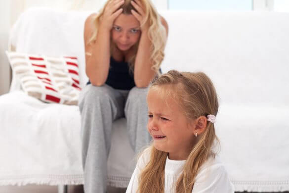A mother feeling frustrated with her preschool-aged daughter.