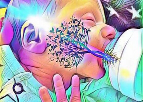 Nino mamando de un biberon