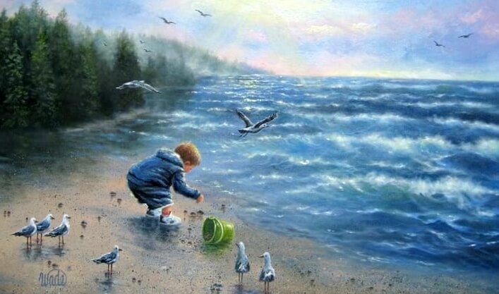 niño jugando en la playa