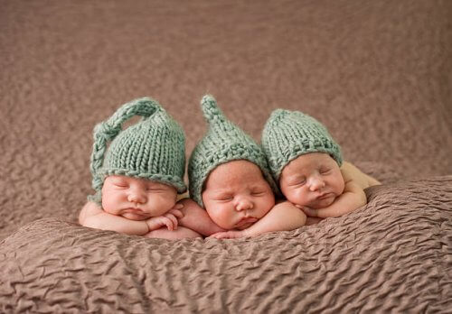 Triplet newborn babies.