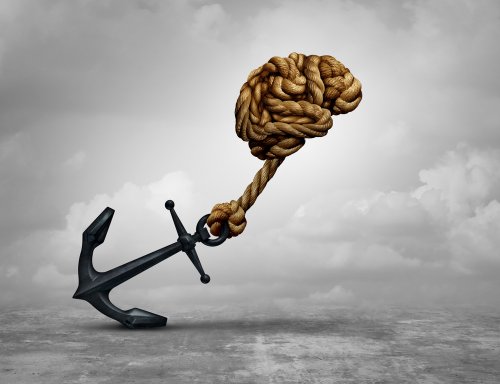 Cerebro arrastrando un ancla para mostrar el rendimiento cognitivo.