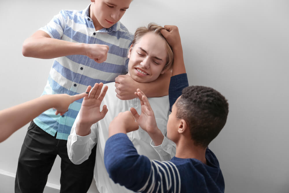 En tenåring som lider av mobbing.