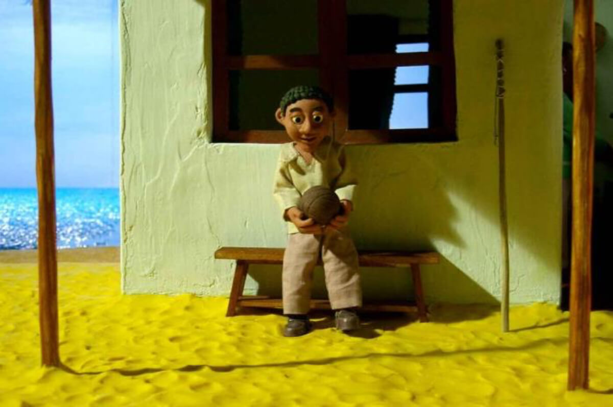 Said sentado en un banco.