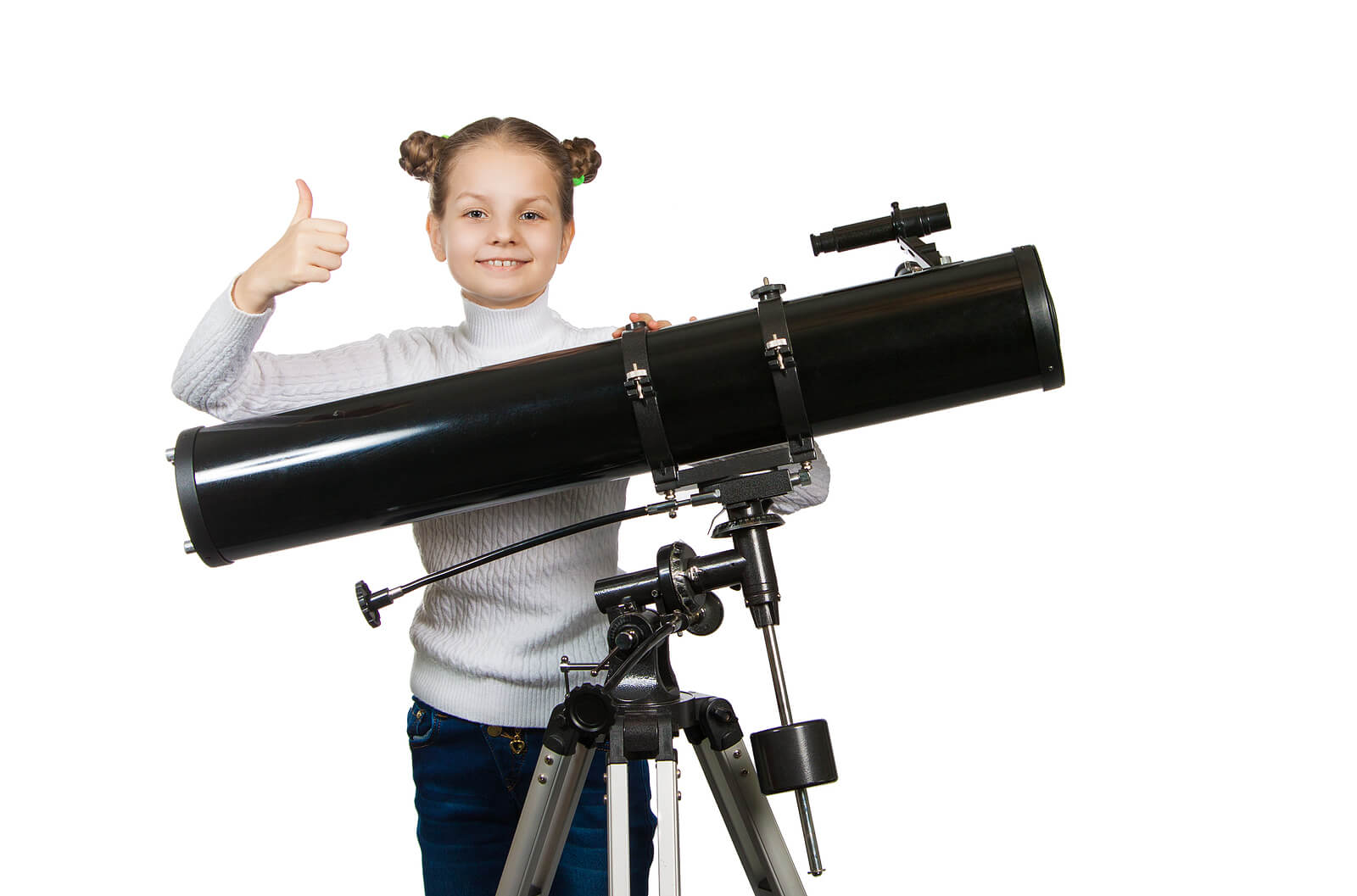 A young girl using a large telescope.
