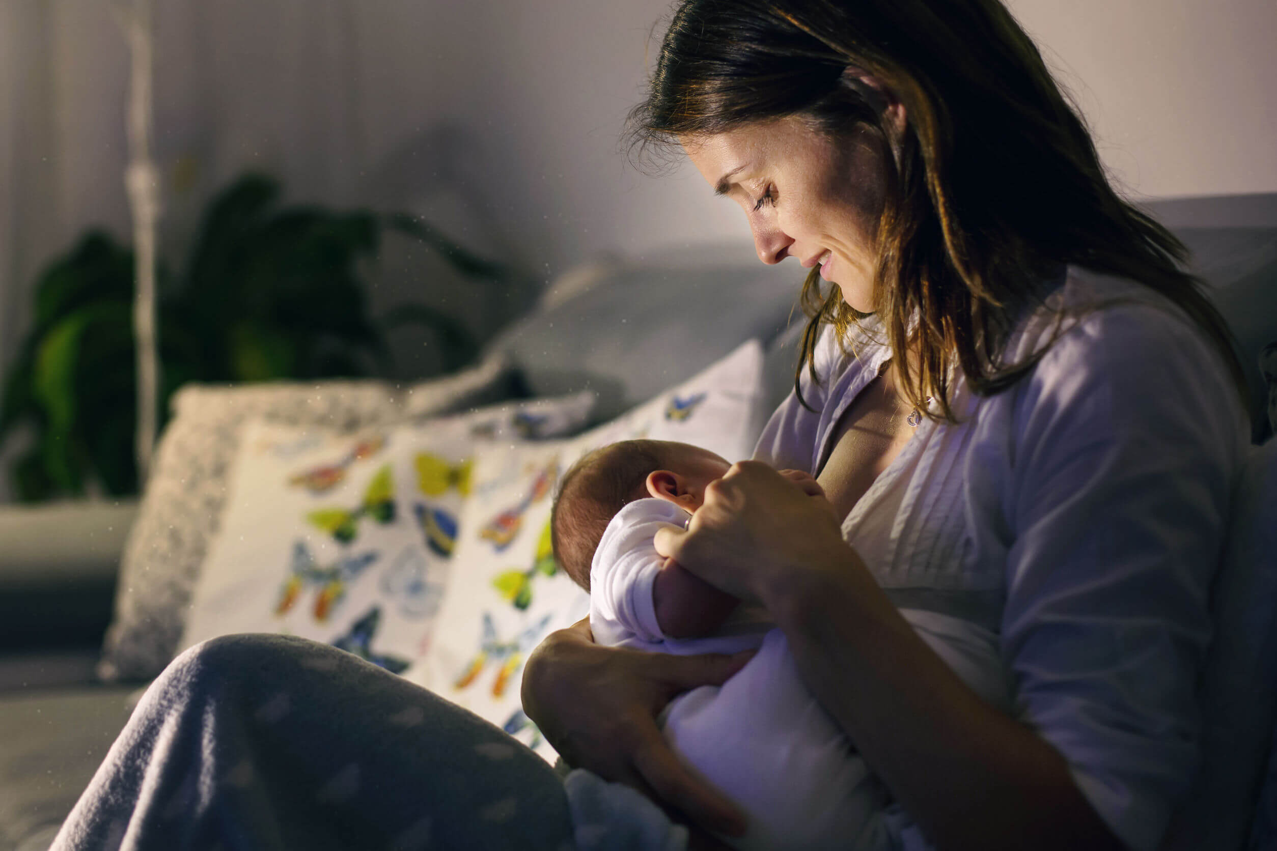 A mother breastfeeding her baby.