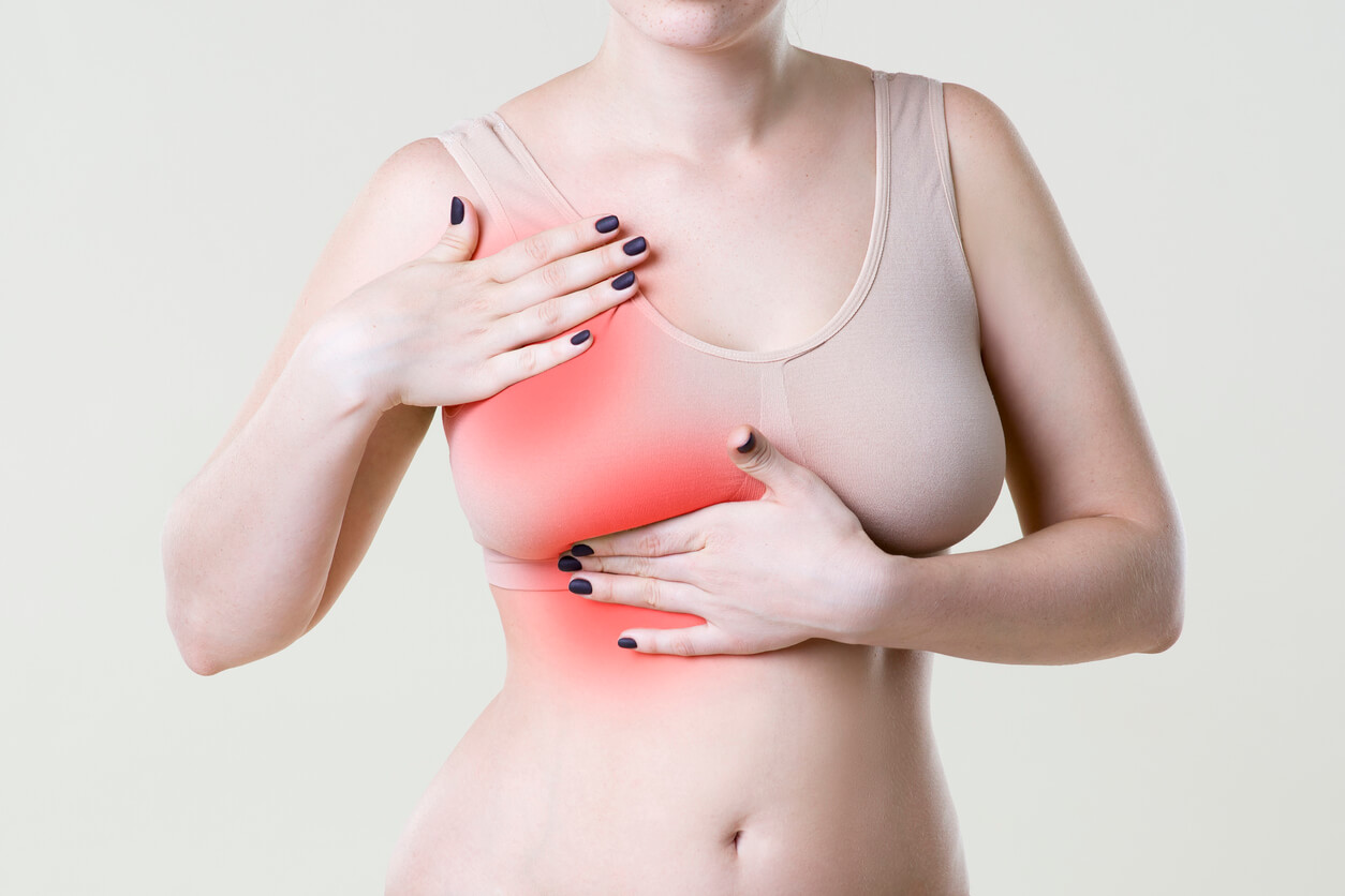A woman with breast pain.
