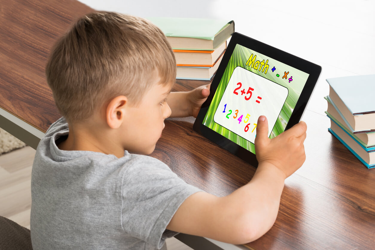 A child using a tablet.