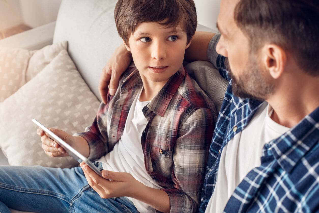A father taling to his son about a difficult subject.