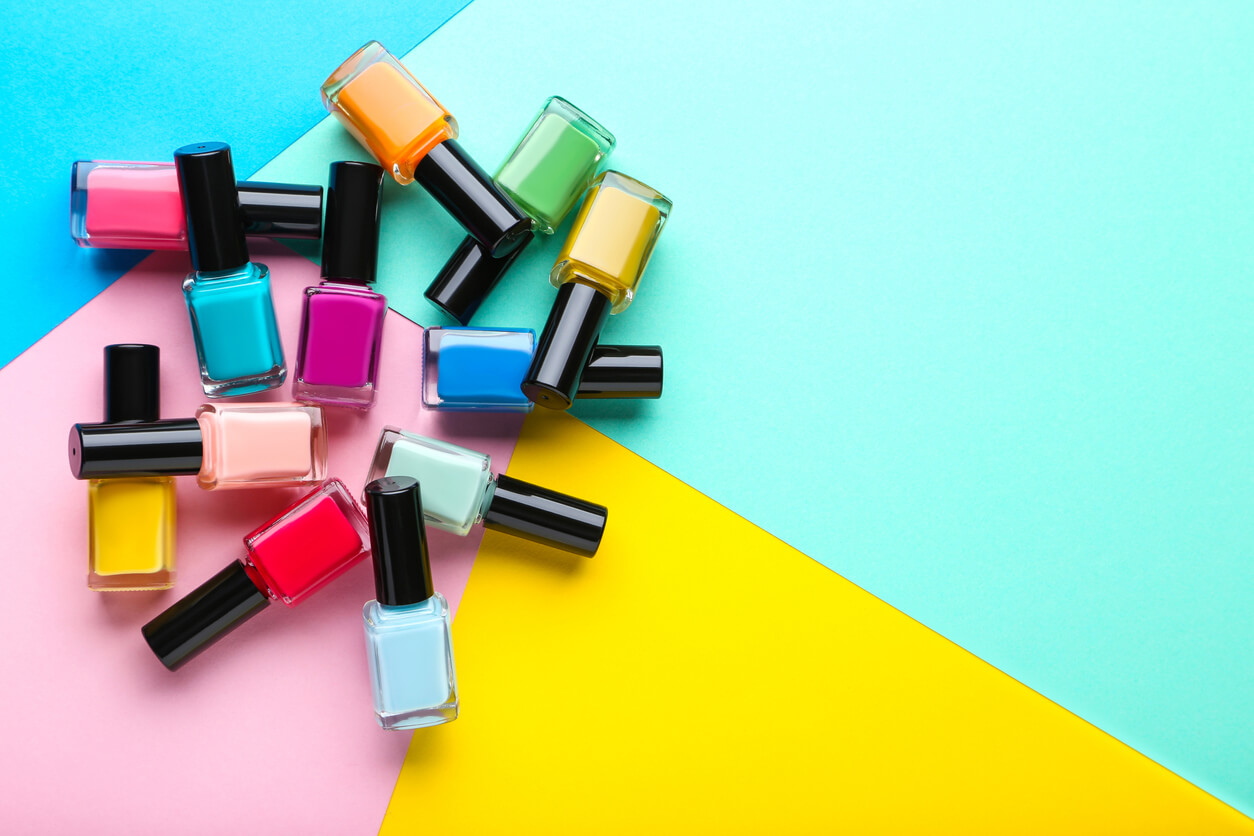 Bright nail polish colors on a bright background.