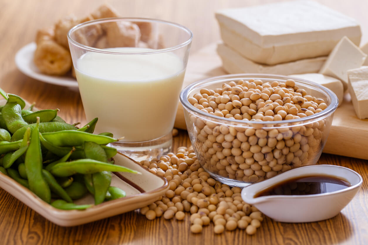 Soy in different forms, including milk, sauce, dry beans, and tofu.