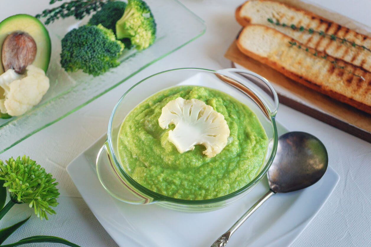 A bowl of cauliflour and brocolli puree.