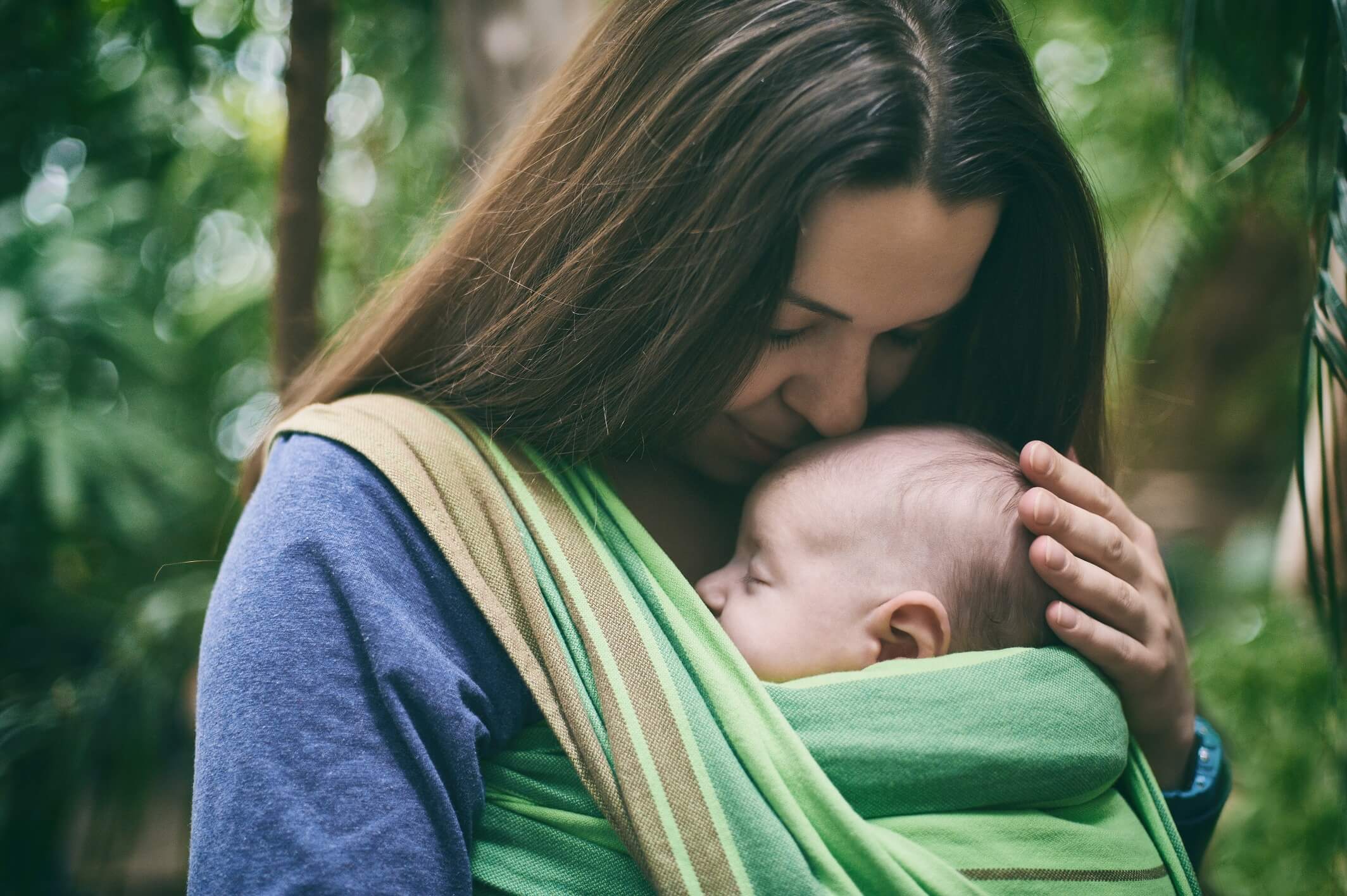 must-have producten voor uitstapjes met je baby zoals een draagdoek