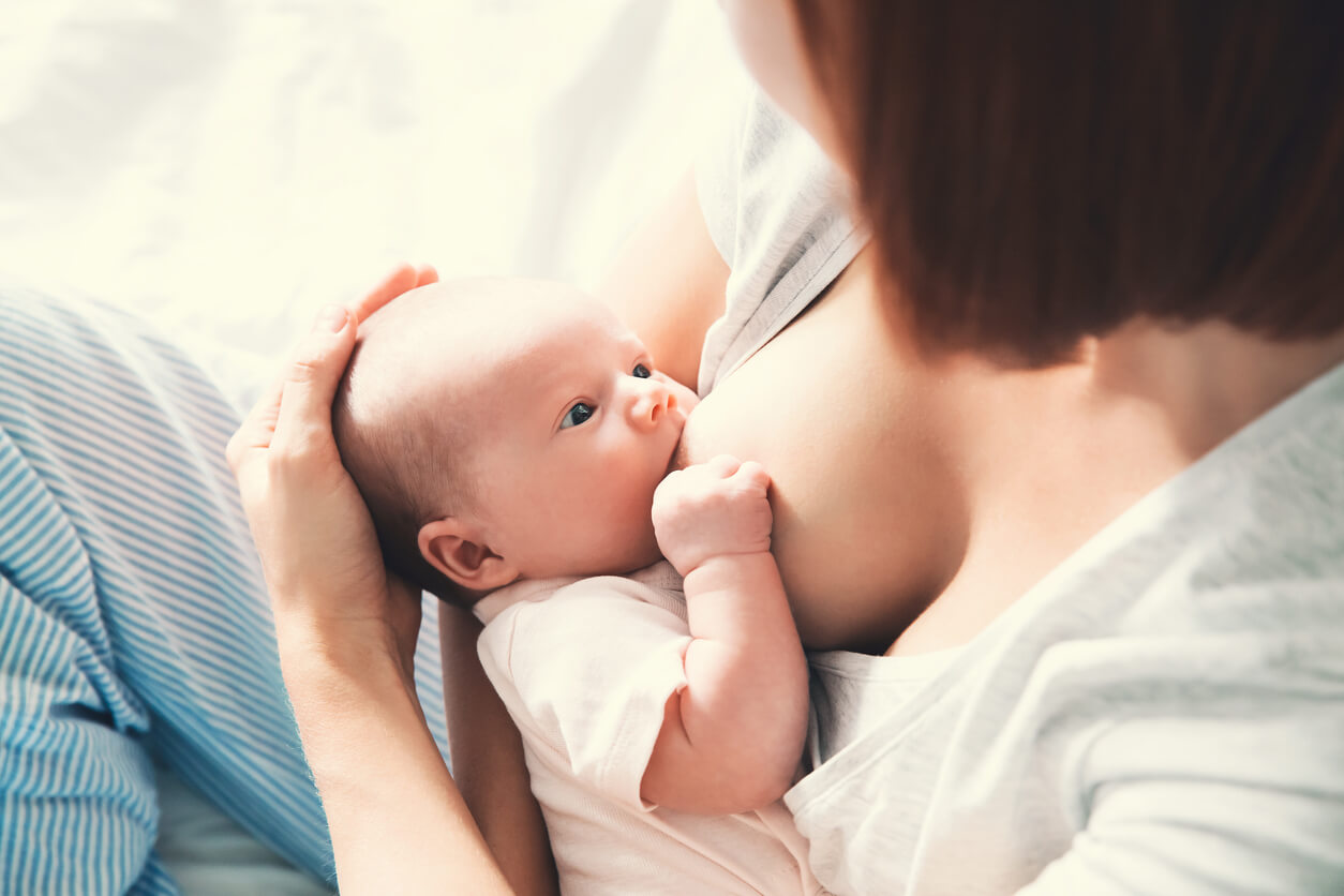 A newborn breastfeeding.