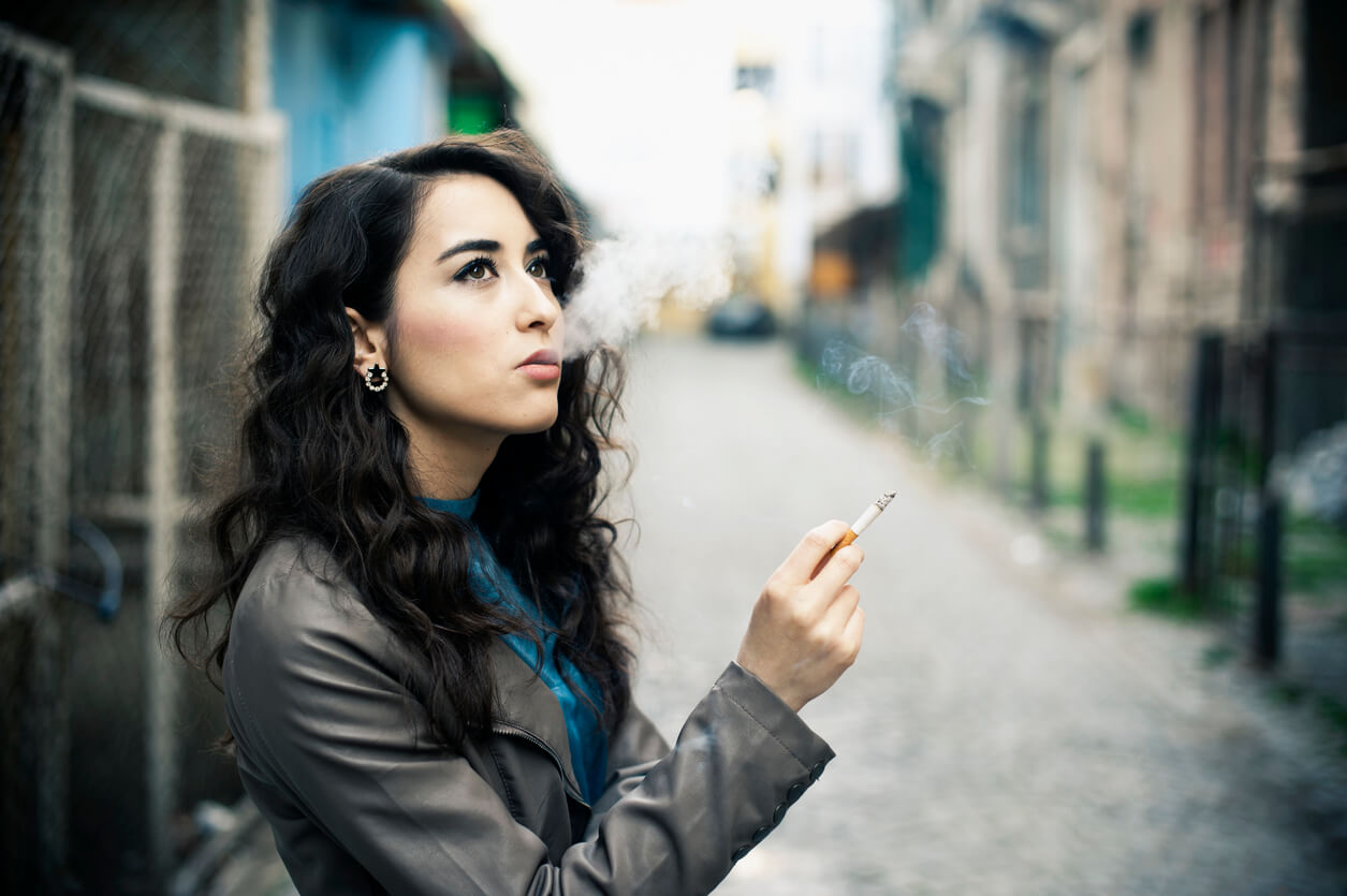 A woman smoking.