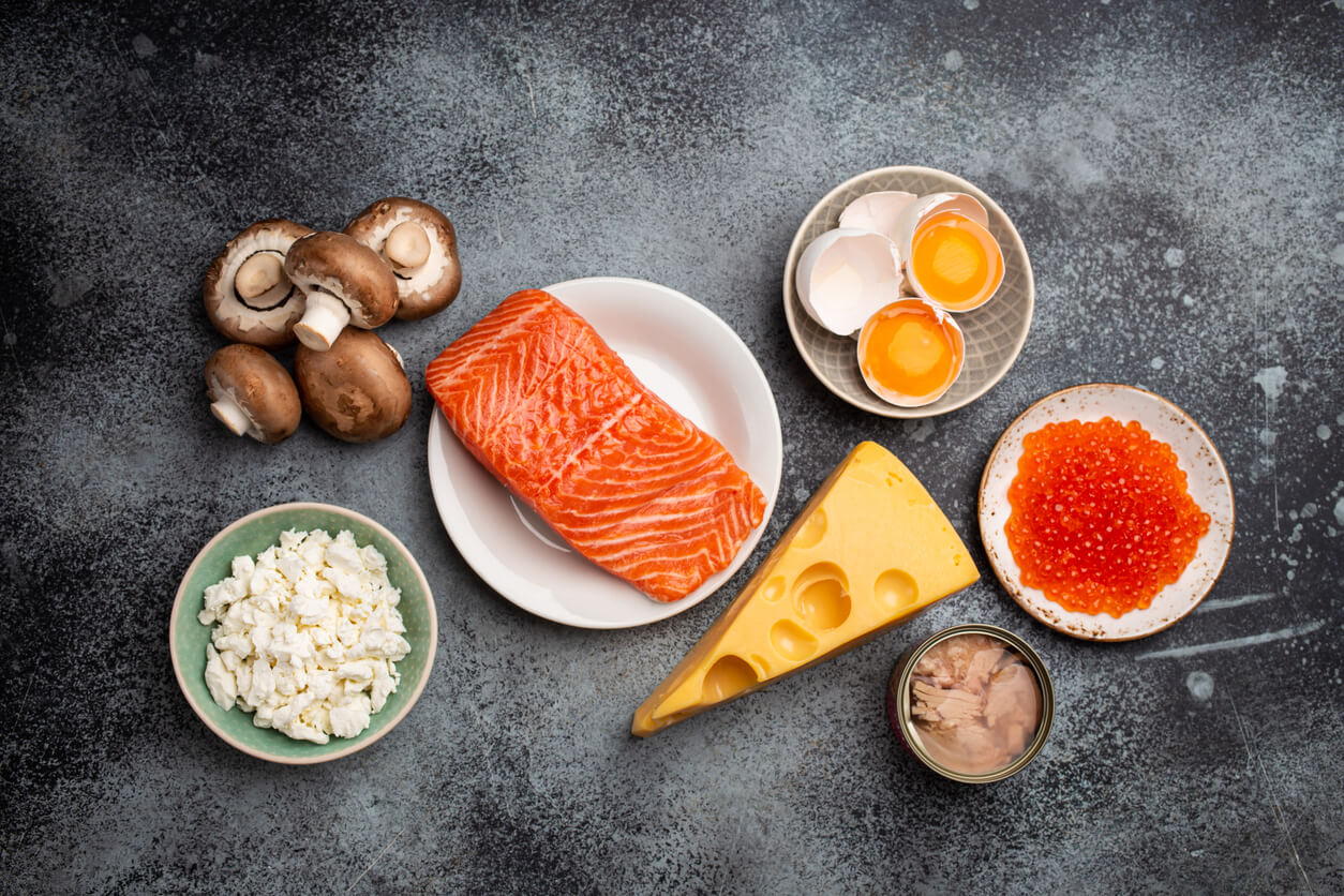 Sources of vitamin D, including eggs, cheese, tuna, salmon, and mushrooms.