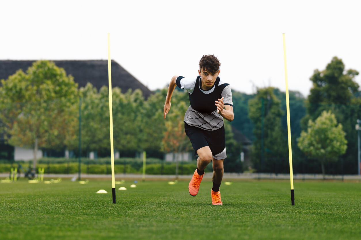 A teenager training for soccer.