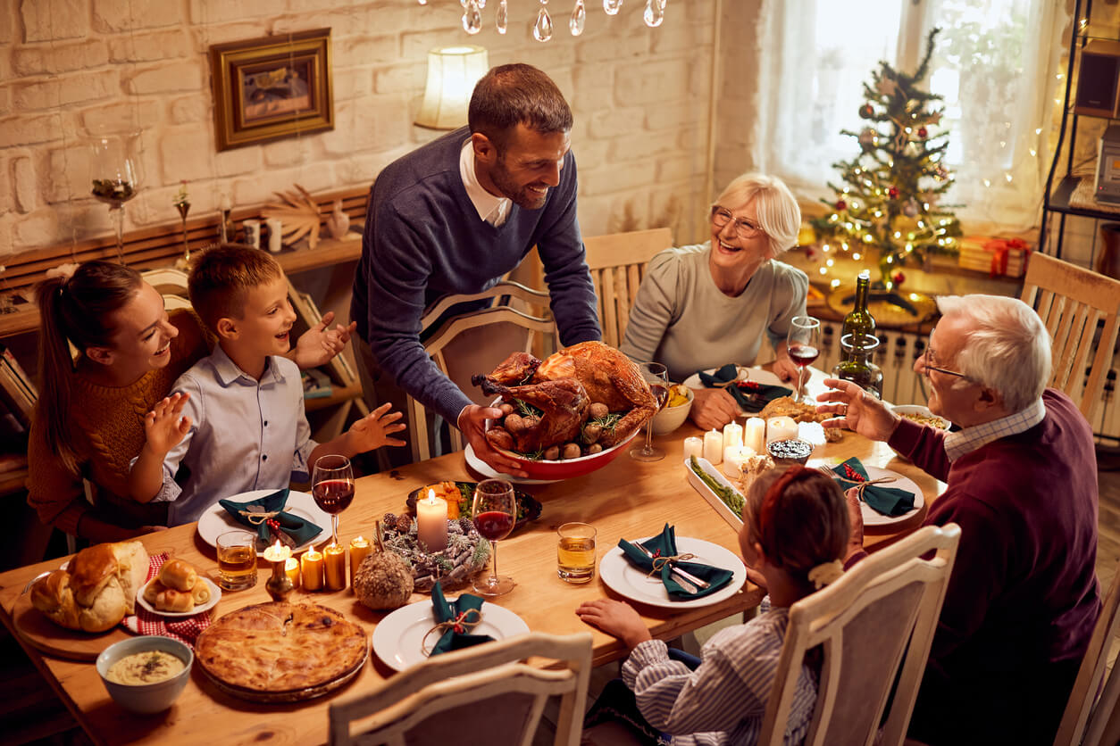 A family enjoying a Christmas meal.