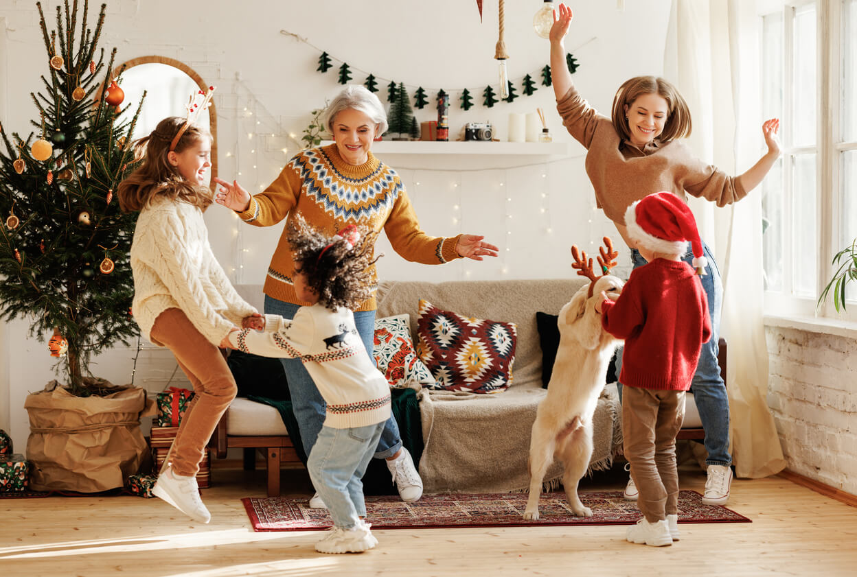 A family dancing to Christmas music.