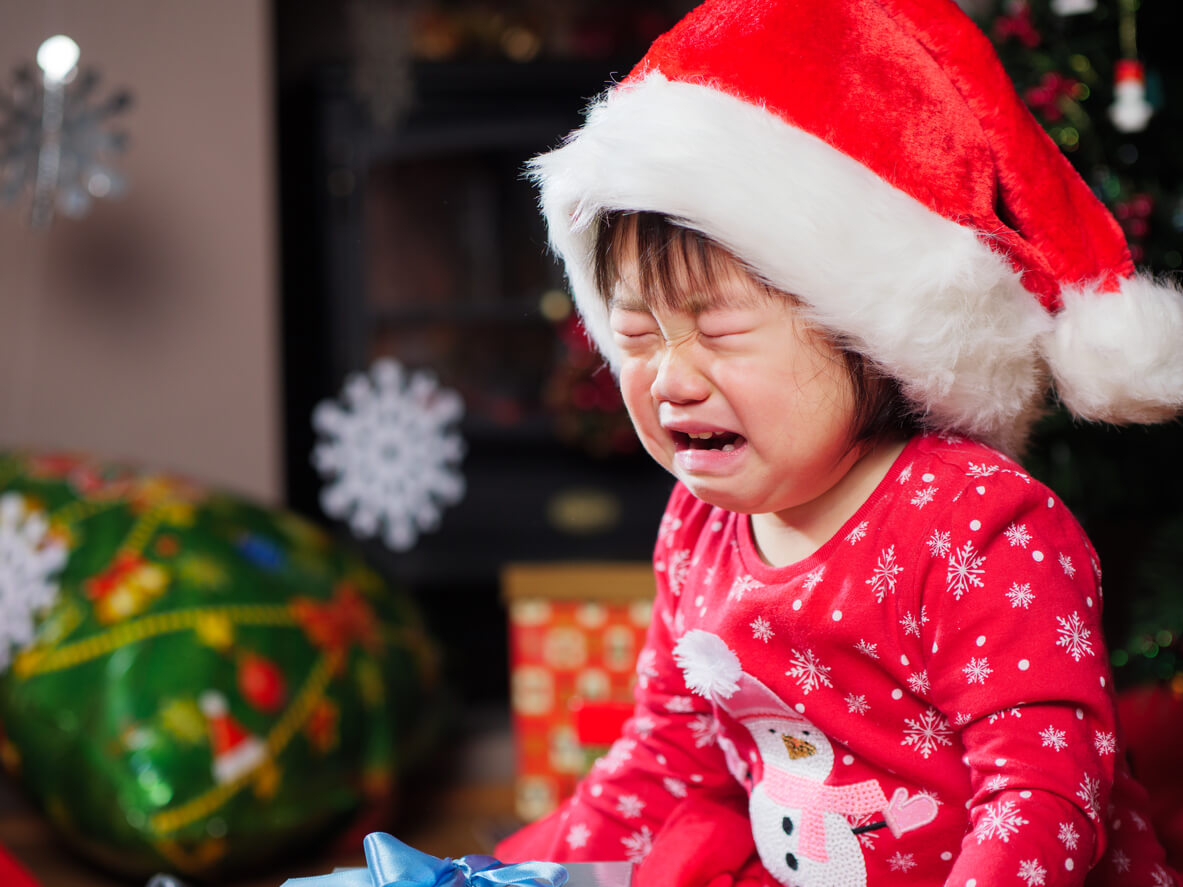 A child crying at Christmas.