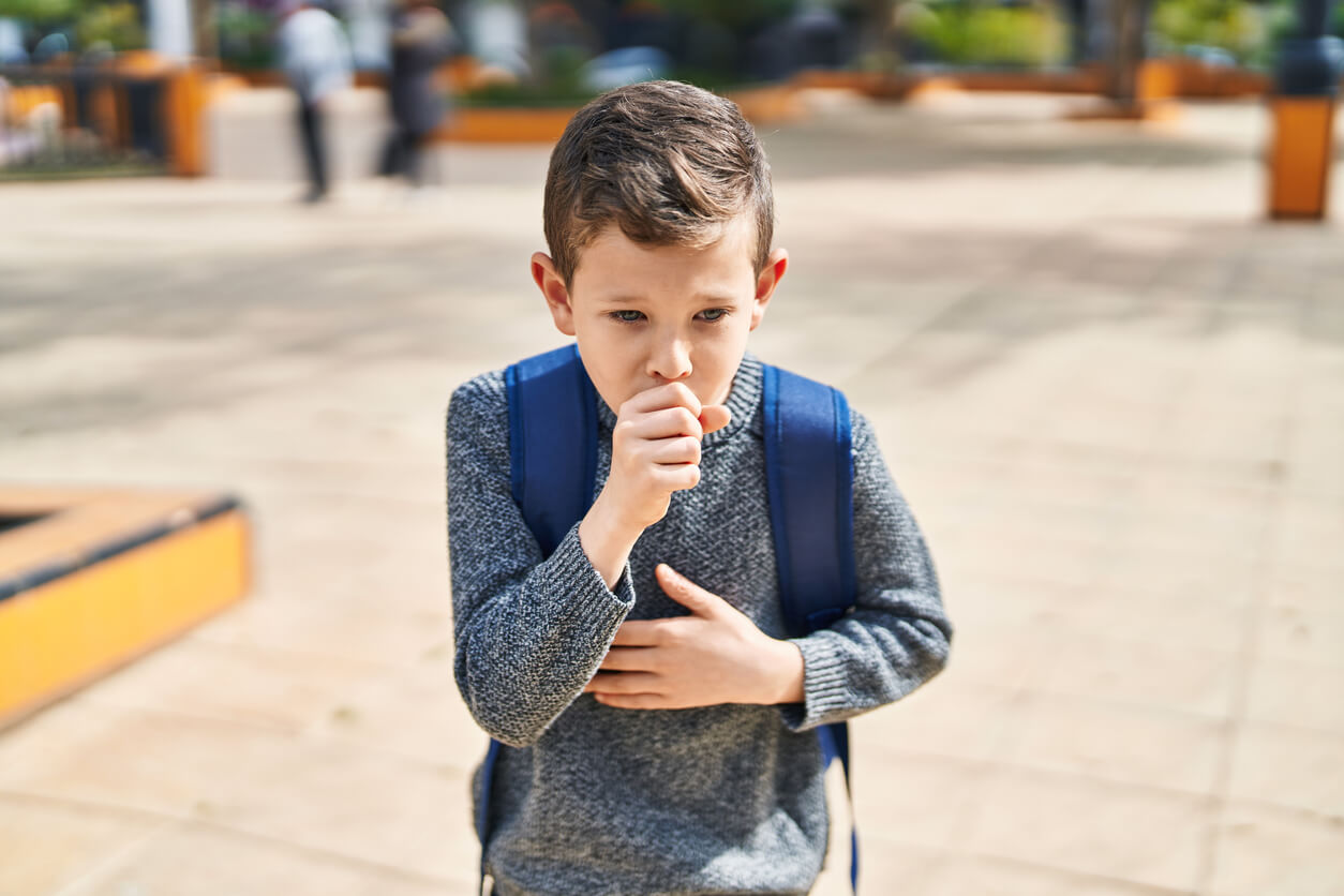 A child coughing.