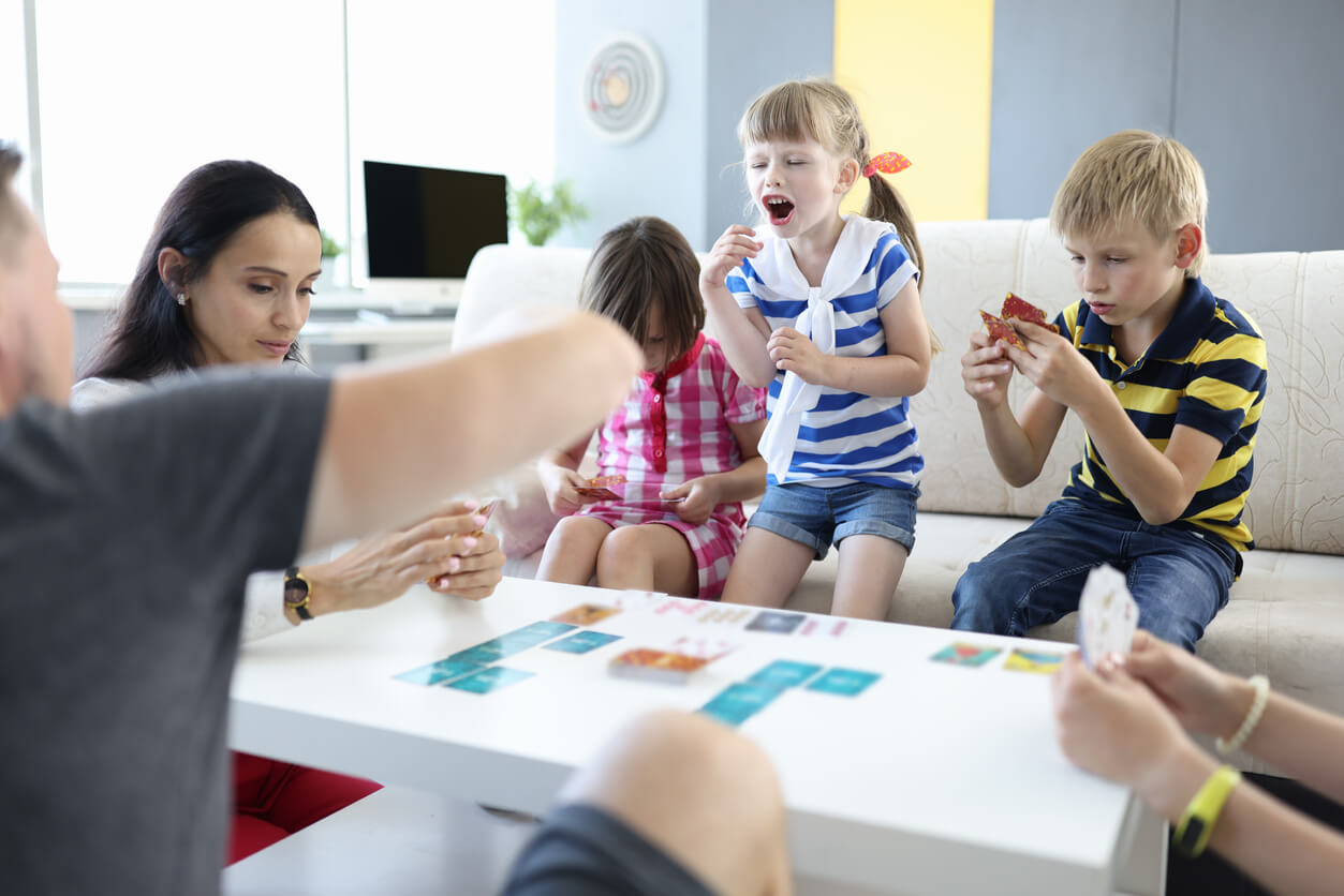 Children playing a game with their parents.