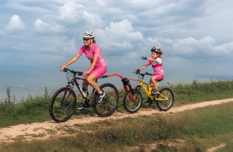 Barra de remolque para moverse en bicicleta con niños
